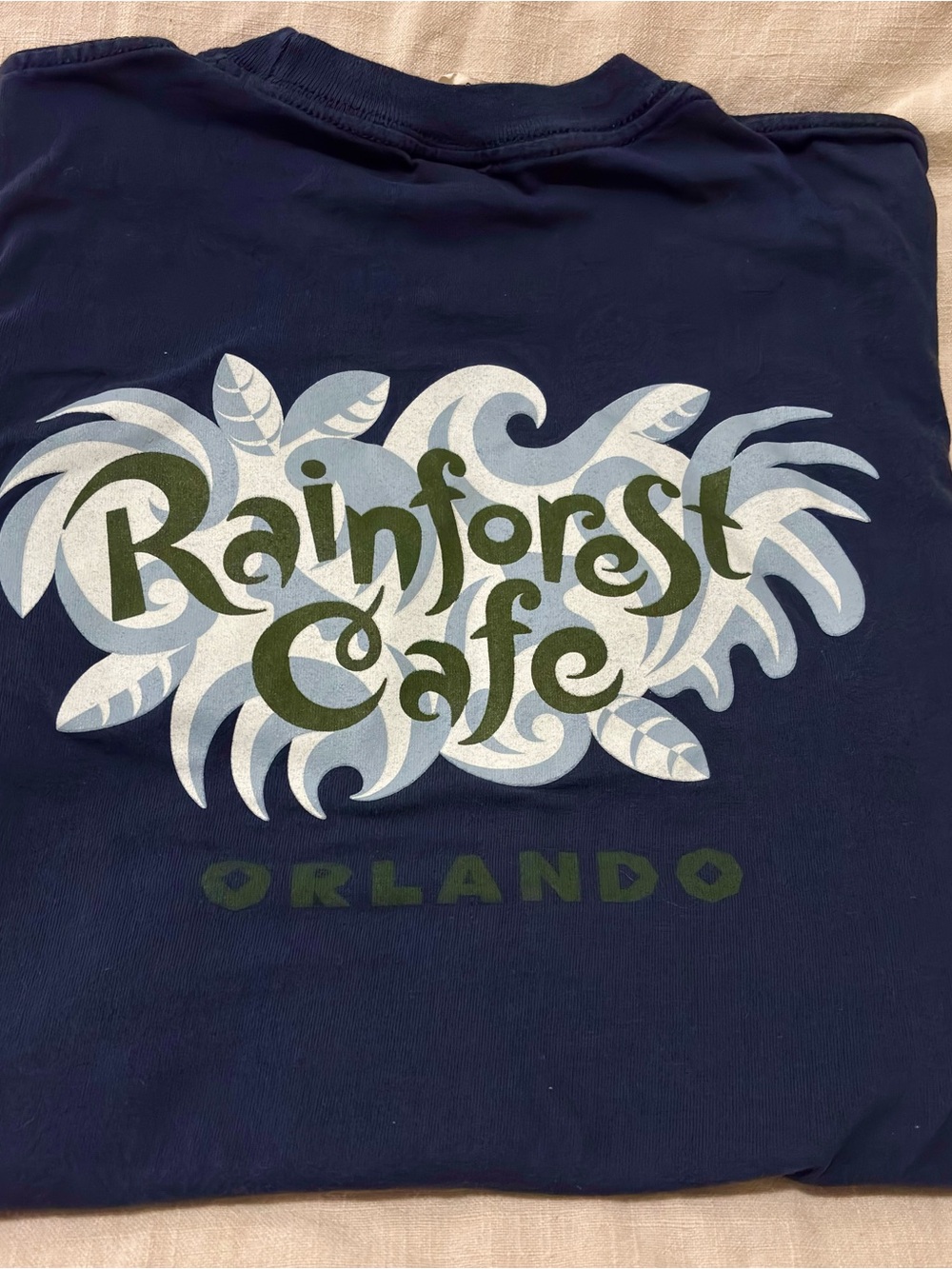 Vintage RAINFOREST Cafe Navy Graphic Tee with Green & Light Blue Logo